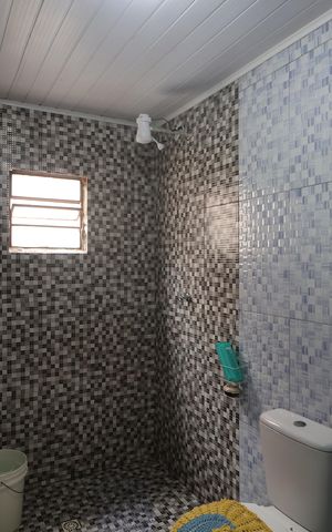 Casa à venda com 52m², 1 quarto e 1 vagaBanheiro