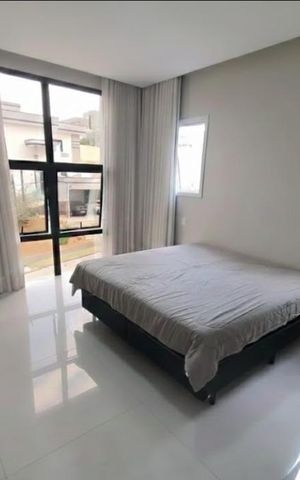 Casa de condomínio à venda com 440m², 4 quartos e 6 vagas
