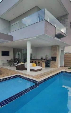 Casa de condomínio à venda com 440m², 4 quartos e 6 vagas