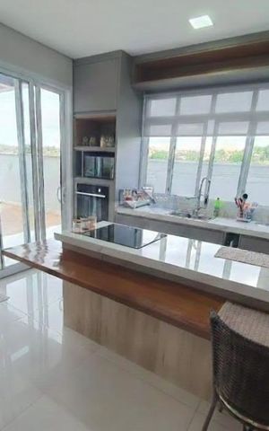 Casa de condomínio à venda com 440m², 4 quartos e 6 vagas