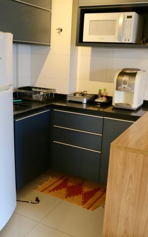 Studio à venda com 33m², 1 quarto e 1 vaga Studio à venda com 33m², 1 quarto e 1 vagaCozinha