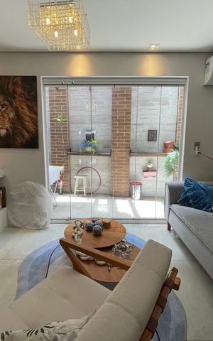 Casa de condomínio à venda com 136m², 3 quartos e 2 vagas Casa de condomínio à venda com 136m², 3 quartos e 2 vagasSala