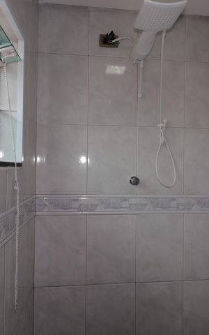 Casa à venda com 80m², 3 quartos e 1 vagaBanheiro da Suíte - Box