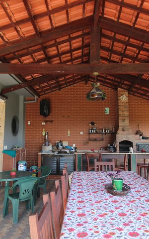 Casa de condomínio à venda com 1500m², 4 quartos e 3 vagasFundos da casa - Churrasqueira