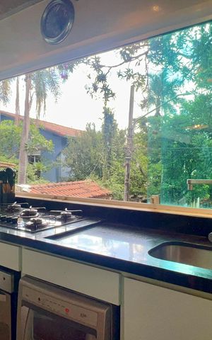 Casa à venda com 110m², 2 quartos e 2 vagas Casa à venda com 110m², 2 quartos e 2 vagasCozinha