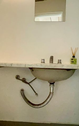 Casa à venda com 110m², 2 quartos e 2 vagas Casa à venda com 110m², 2 quartos e 2 vagasBanheiro da Suíte 2