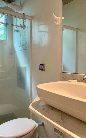 Casa à venda com 110m², 2 quartos e 2 vagas Casa à venda com 110m², 2 quartos e 2 vagasBanheiro da Suíte 1