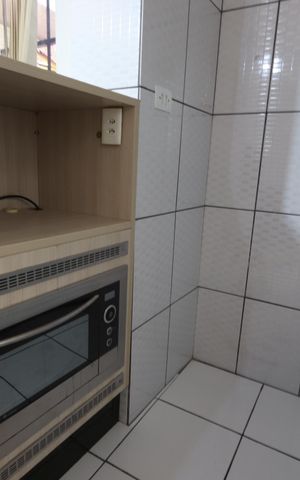 Casa de condomínio para alugar com 76m², 2 quartos e 1 vagaCozinha
