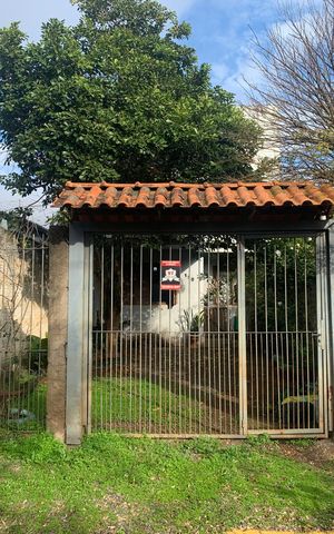 Casa à venda com 88m², 3 quartos e 2 vagas Casa à venda com 88m², 3 quartos e 2 vagasFachada
