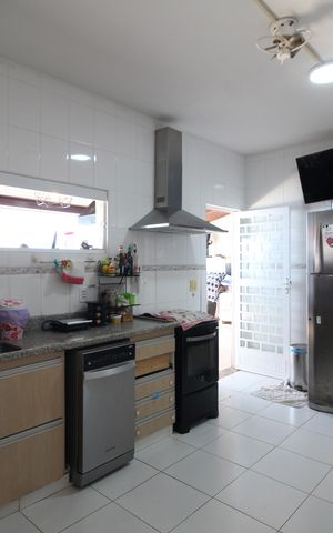 Casa de condomínio à venda com 271m², 4 quartos e 4 vagasCozinha
