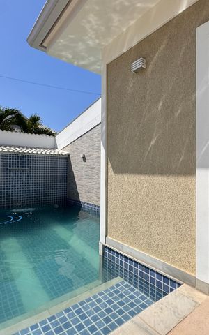 Casa de condomínio à venda com 450m², 4 quartos e 3 vagas Casa de condomínio à venda com 450m², 4 quartos e 3 vagasÁrea externa