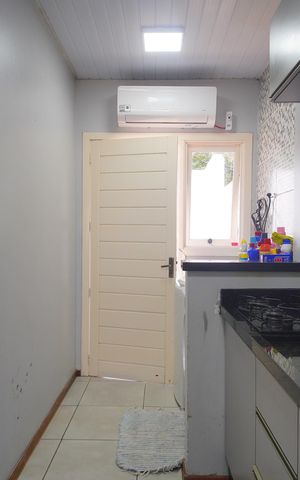Casa de condomínio à venda com 48m², 2 quartos e 2 vagasCozinha