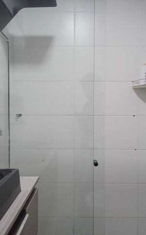 Casa de condomínio à venda com 48m², 2 quartos e 2 vagasBanheiro