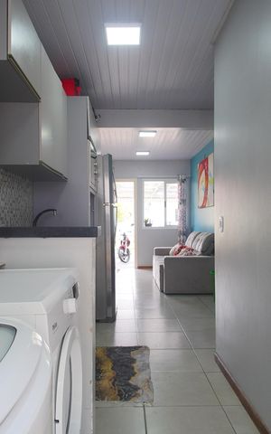Casa de condomínio à venda com 48m², 2 quartos e 2 vagasCozinha