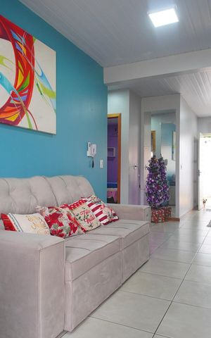 Casa de condomínio à venda com 48m², 2 quartos e 2 vagasSala