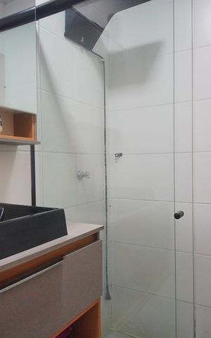 Casa de condomínio à venda com 48m², 2 quartos e 2 vagasBanheiro