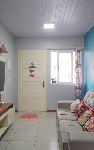 Casa de condomínio à venda com 48m², 2 quartos e 2 vagasSala