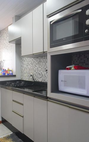 Casa de condomínio à venda com 48m², 2 quartos e 2 vagasCozinha