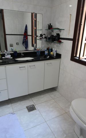 Casa de condomínio à venda com 250m², 4 quartos e 3 vagasQuarto 3 - Suíte