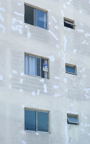 Apartamento à venda com 79m², 2 quartos e 1 vagaFachada + plaquinha