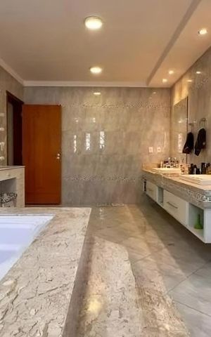 Casa de condomínio à venda com 580m², 3 quartos e 6 vagas