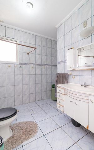 Casa à venda com 140m², 3 quartos e 2 vagasBanheiro da Suíte