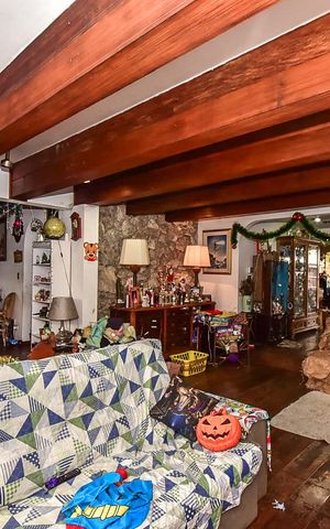 Casa à venda com 495m², 4 quartos e 3 vagasSala
