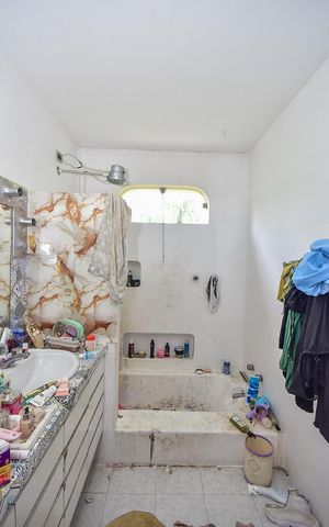 Casa à venda com 495m², 4 quartos e 3 vagasBanheiro Suíte 2