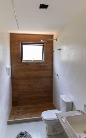 Casa de condomínio à venda com 206m², 3 quartos e 4 vagas Casa de condomínio à venda com 206m², 3 quartos e 4 vagasBanheiro Social