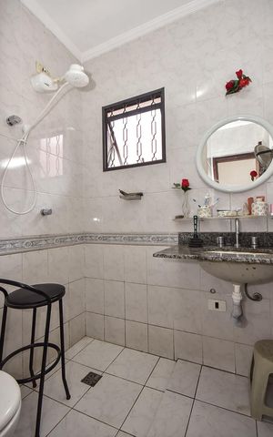 Casa à venda com 125m², 3 quartos e 2 vagasBanheiro Suíte 