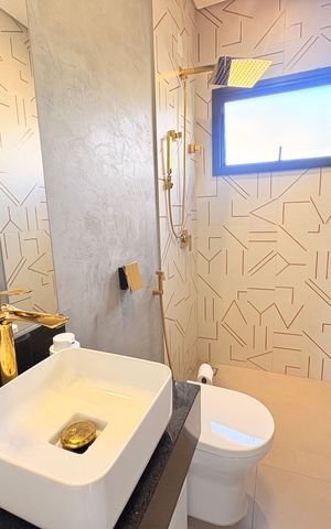 Casa de condomínio à venda com 500m², 4 quartos e 6 vagasBanheiro da área gourmet