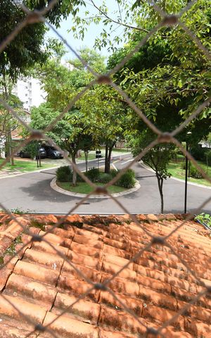 Casa de condomínio para alugar com 415m², 3 quartos e 5 vagasQuarto Suíte 1 - Vista