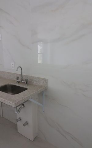 Apartamento à venda com 92m², 2 quartos e 2 vagasCozinha e Área de Serviço