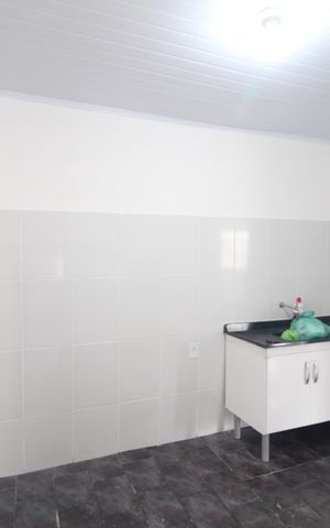Casa para alugar com 50m², 1 quarto e 2 vagasCozinha