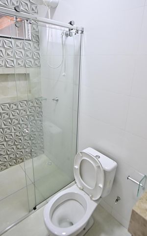 Casa à venda com 180m², 3 quartos e 3 vagas Casa à venda com 180m², 3 quartos e 3 vagasBanheiro da Suíte 1