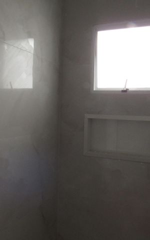 Casa à venda com 130m², 3 quartos e 4 vagasBanheiro da Suíte 2