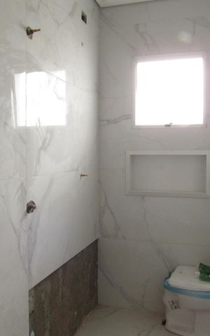 Casa à venda com 130m², 3 quartos e 4 vagasBanheiro da Suíte 3