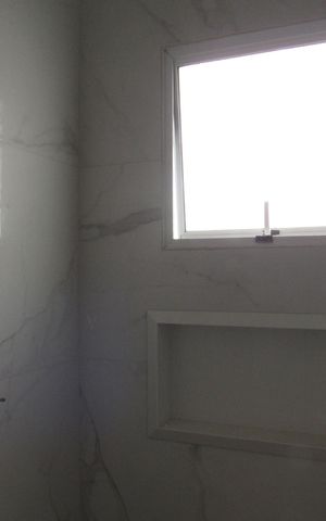 Casa à venda com 130m², 3 quartos e 4 vagasBanheiro da Suíte 3