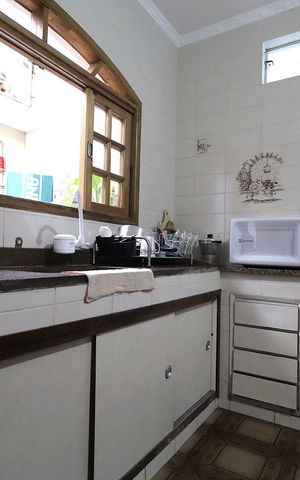Casa à venda com 150m², 3 quartos e 2 vagas Casa à venda com 150m², 3 quartos e 2 vagasCozinha