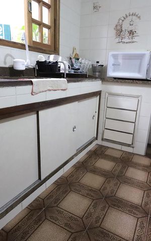 Casa à venda com 150m², 3 quartos e 2 vagas Casa à venda com 150m², 3 quartos e 2 vagasCozinha