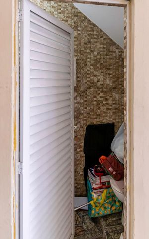 Casa à venda com 410m², 4 quartos e 2 vagas Casa à venda com 410m², 4 quartos e 2 vagasBanheiro da Garagem