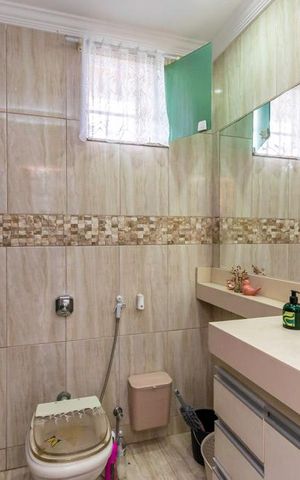 Casa à venda com 410m², 4 quartos e 2 vagas Casa à venda com 410m², 4 quartos e 2 vagasBanheiro da Suíte