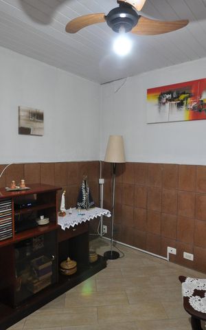 Casa à venda com 242m², 3 quartos e 2 vagasSala de TV