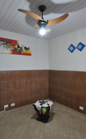 Casa à venda com 242m², 3 quartos e 2 vagasSala de TV