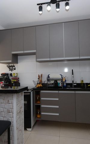 Casa à venda com 77m², 2 quartos e 2 vagasCozinha
