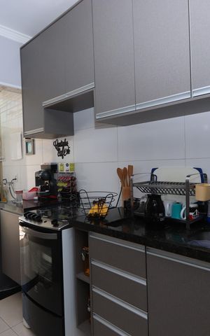 Casa à venda com 77m², 2 quartos e 2 vagasCozinha