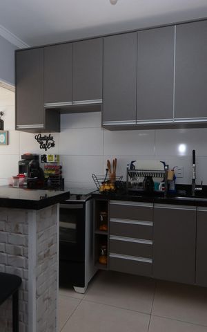 Casa à venda com 77m², 2 quartos e 2 vagasCozinha