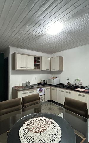 Casa à venda com 130m², 3 quartos e sem vaga Casa à venda com 130m², 3 quartos e sem vagaCozinha