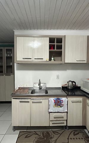 Casa à venda com 130m², 3 quartos e sem vaga Casa à venda com 130m², 3 quartos e sem vagaCozinha