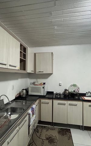 Casa à venda com 130m², 3 quartos e sem vaga Casa à venda com 130m², 3 quartos e sem vagaCozinha